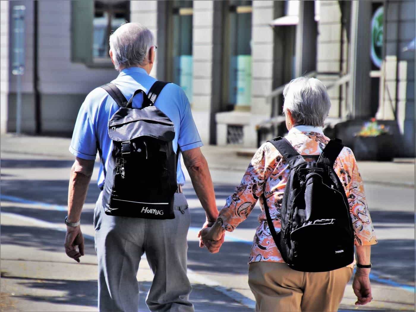 An older person walking outdoors