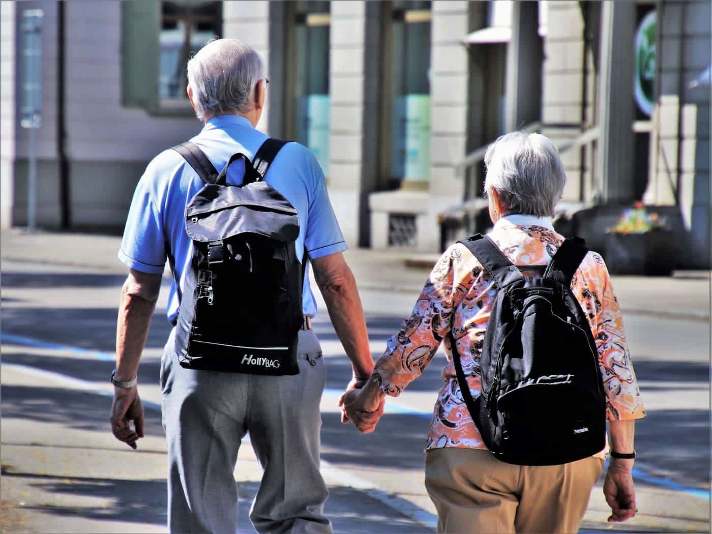 An older person walking outdoors